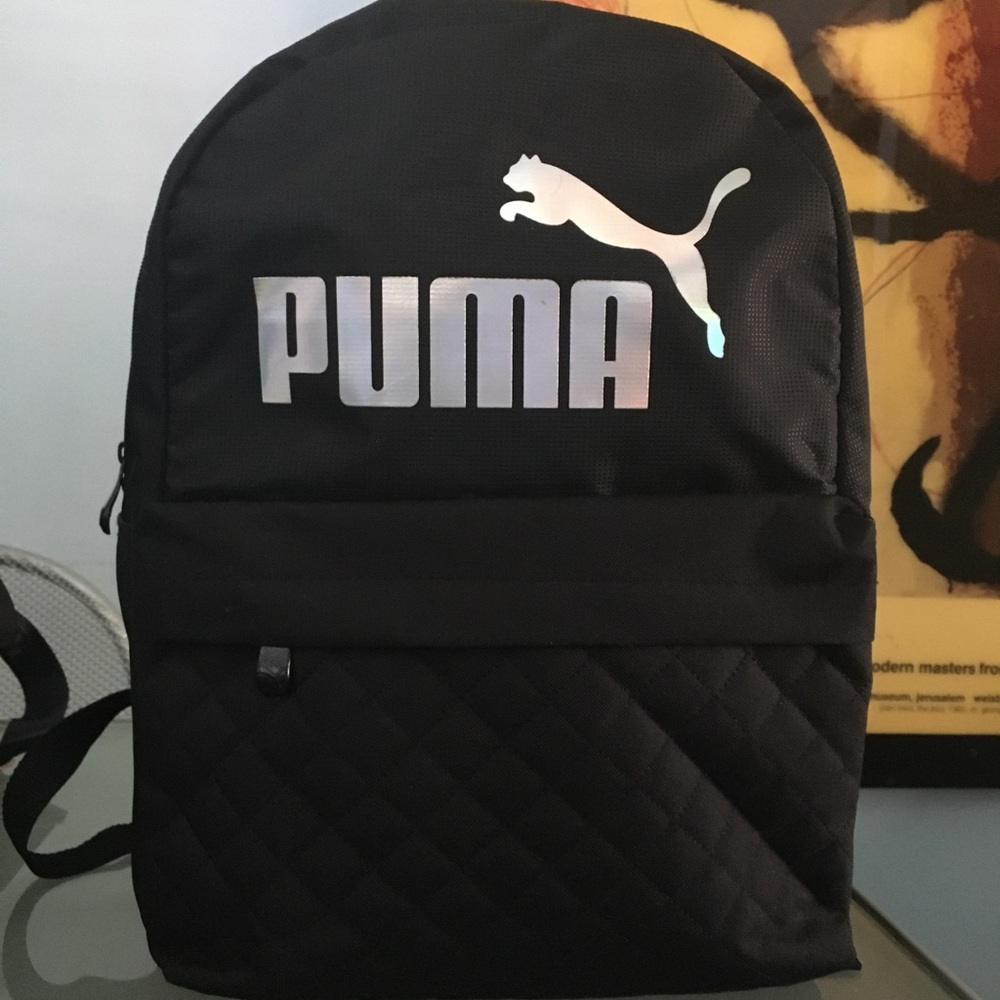 Puma back pack worn one time briefly- unisex